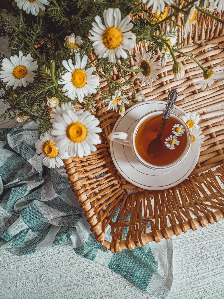 tea and flowers at center of naturopathic medicine